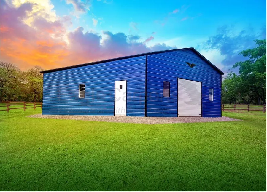 Blue metal garage at sunset